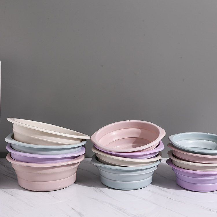 Creative mini foldable plastic portable compression travel pet mini folding food bowl source factory direct sales
