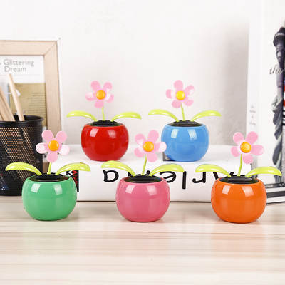 Factory direct solar Apple flower solar automatic swing sunflower car ornaments can be printed LOGO