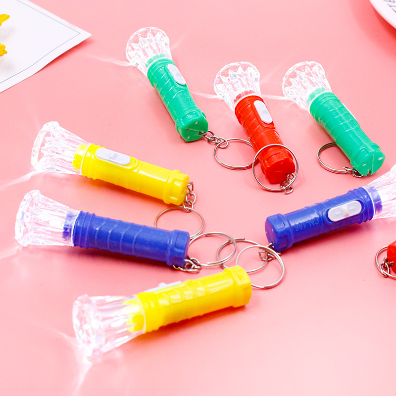 Transparent mini toy small flashlight electronic luminous portable flashlight children prizes made small gifts wholesale
