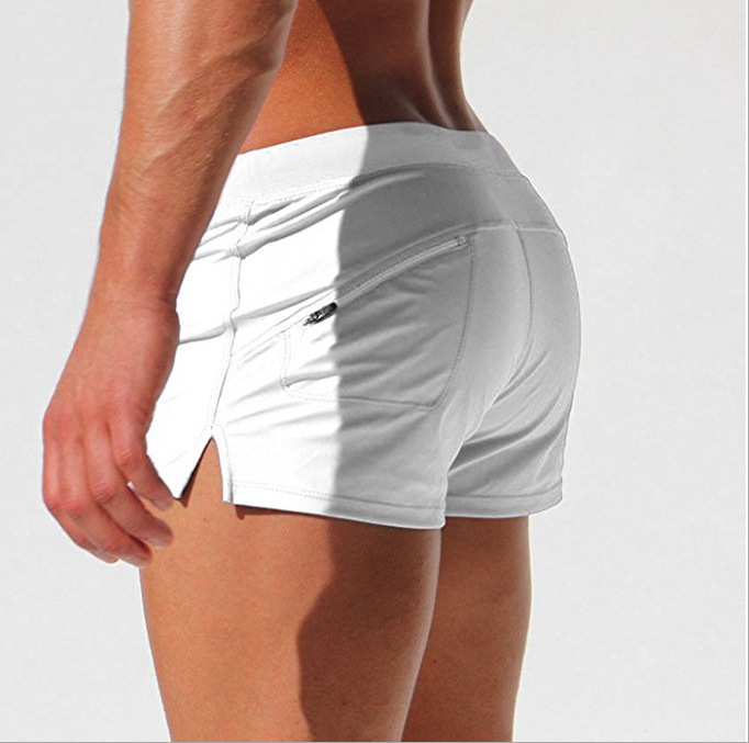 European and American men's solid color sexy fashion back pocket design beach breathable quick-drying pants flat angle beach pants swimming pants