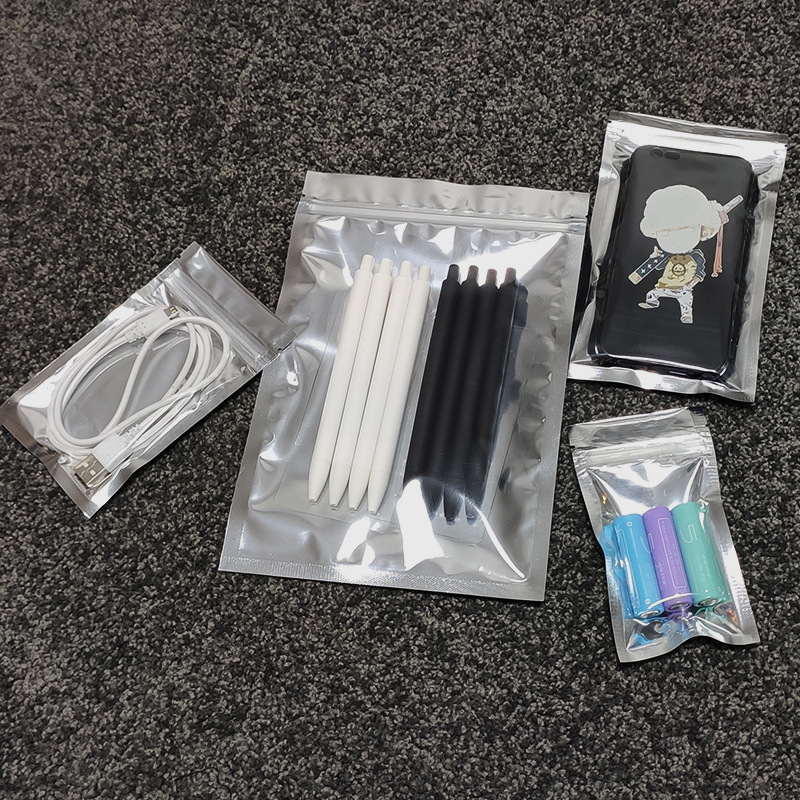 Spot aluminized Yin and Yang self-sealing bag aluminized zipper sealing pocket flat bottom pull bone bag earphone data cable packaging