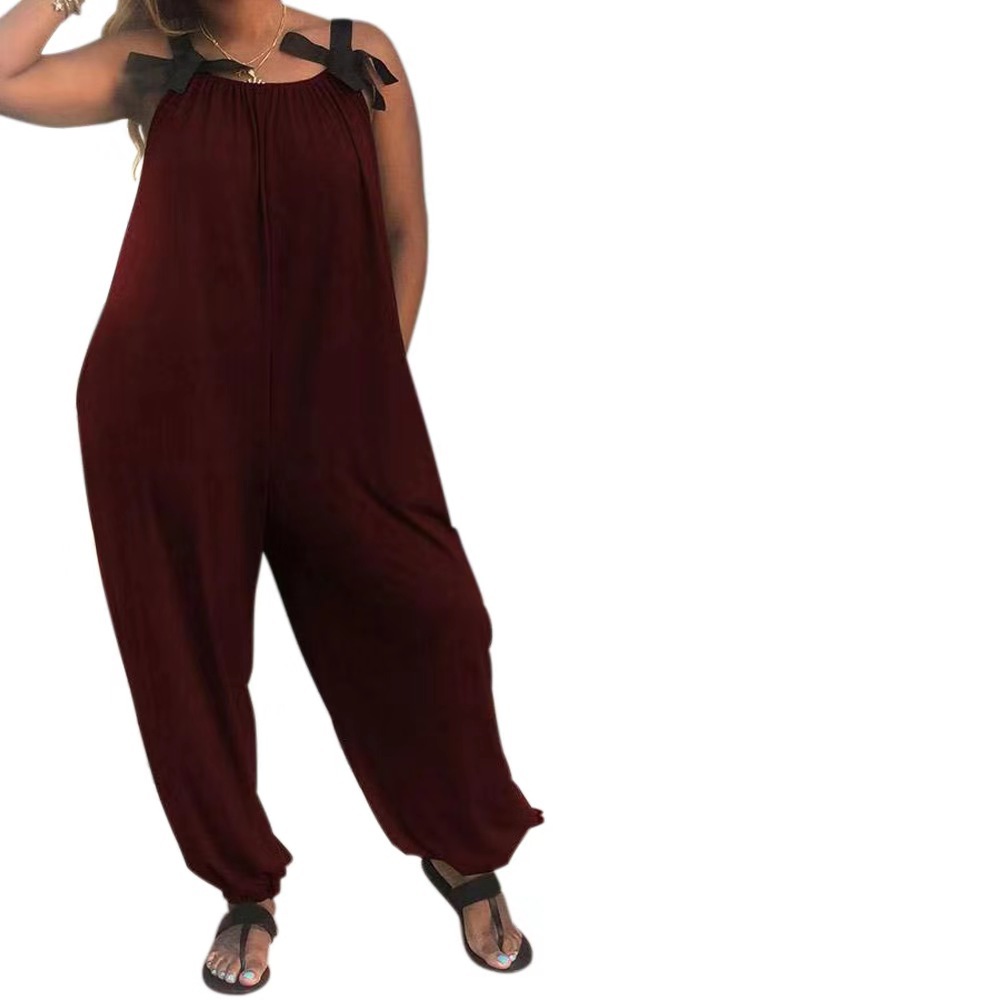 Amazon popular European and American women's solid color loose jumpsuit casual fashion bow shoulder strap sling jumpsuit
