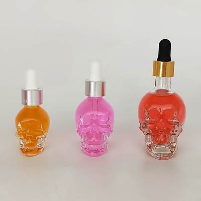 Manufacturers supply and sell all kinds of specifications skull glass bottles skull oil bottles smoke oil bottles cosmetic bottles bottled