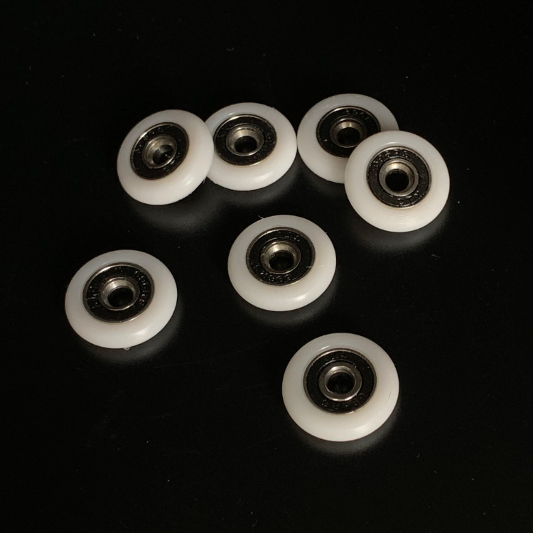 Factory wholesale POM glass door shower room pulley arc 696 injection molding wheel glass sliding door POM wheel