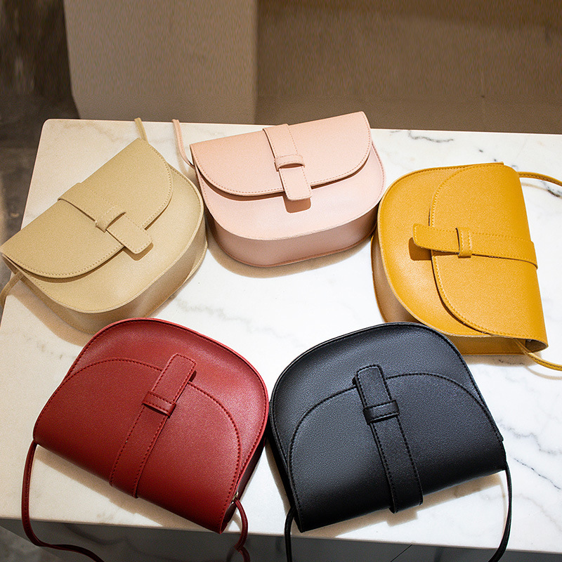 Trendy solid color saddle bag 2023 Japanese and Korean style shell women's bag shoulder bag slung personalized mobile phone small bag wholesale