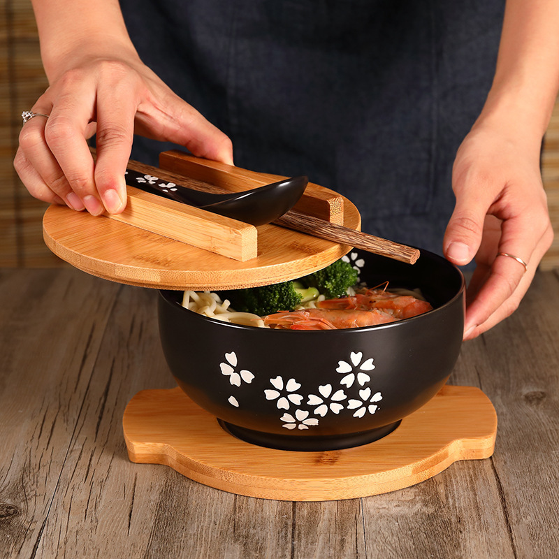 黒い陶磁器の碗は蓋とスプーンの泡の碗の韓国式のスープの碗のご飯の碗の学生の食堂のレストランの日本料理の食器を持っています。|undefined