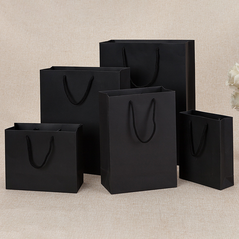 Spot black gift bag paper bag custom clothing handbag wholesale black cardboard bag LOGO factory direct sales