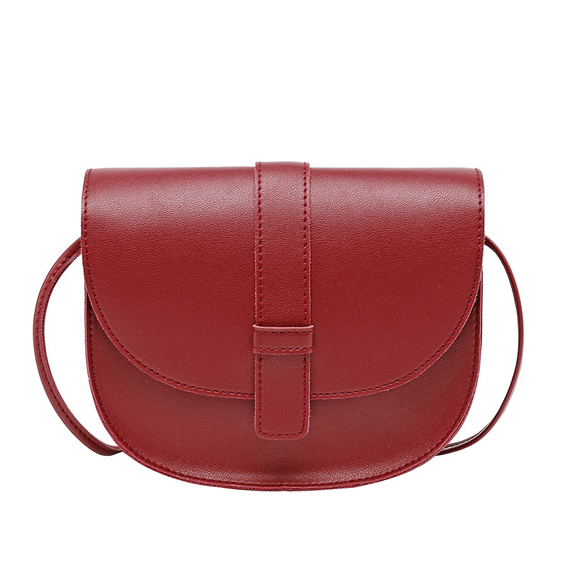 Trendy solid color saddle bag 2023 Japanese and Korean style shell women's bag shoulder bag slung personalized mobile phone small bag wholesale