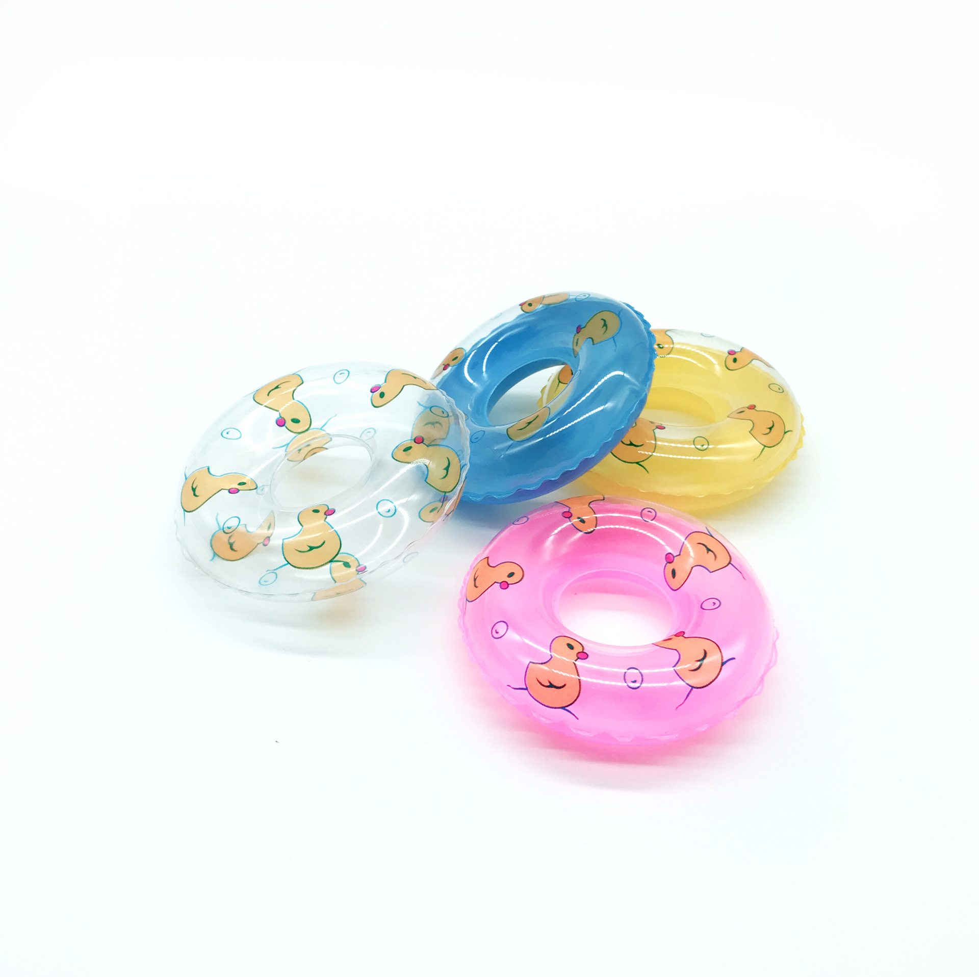 Children's swimming bath toy accessories mini swimming ring milk tea shop gifts small yellow duck swimming donut wholesale