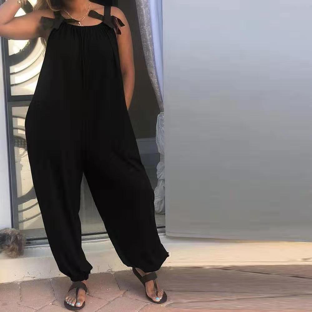 Amazon popular European and American women's solid color loose jumpsuit casual fashion bow shoulder strap sling jumpsuit