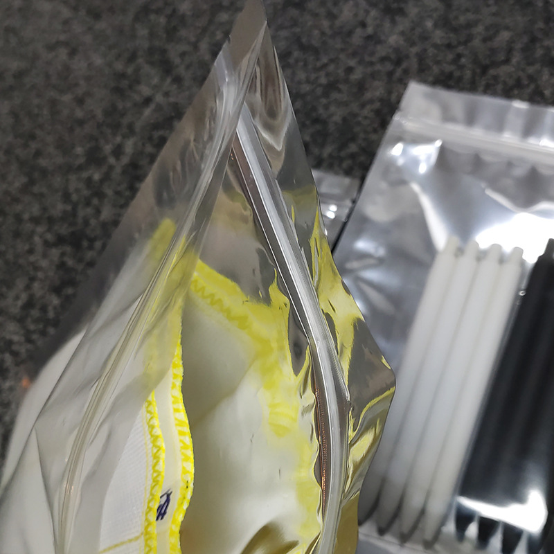 Spot aluminized Yin and Yang self-sealing bag aluminized zipper sealing pocket flat bottom pull bone bag earphone data cable packaging