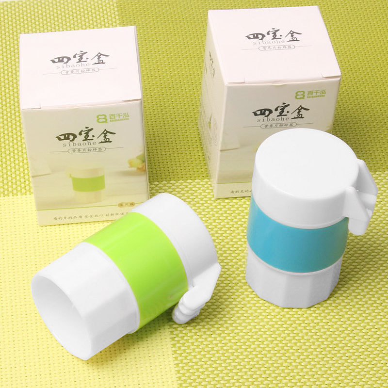 Factory wholesale new plastic four treasure box multi-functional household tablet medicine cutter medicine box medicine grinder medicine grinder