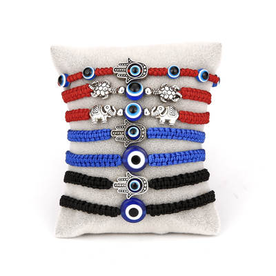 Cross-border hot new Palm two round beads blue eyes evil eye red rope woven adjustable bracelet manufacturers wholesale