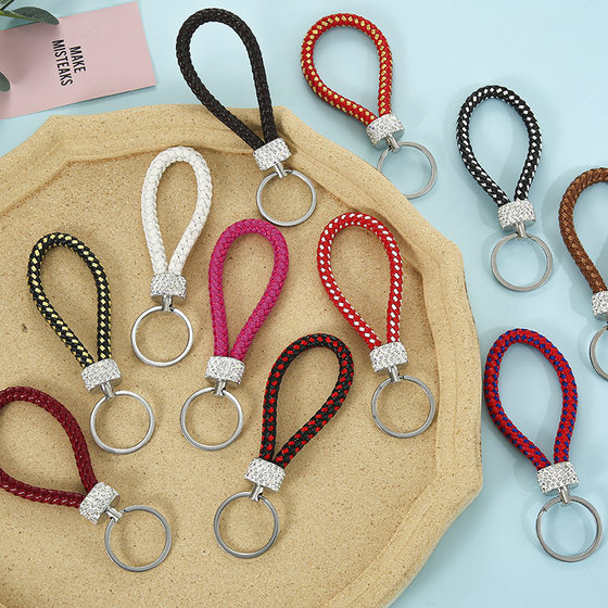 Spot creative woven leather rope keychain pu leather rope car pendant key chain to push small gift manufacturers wholesale