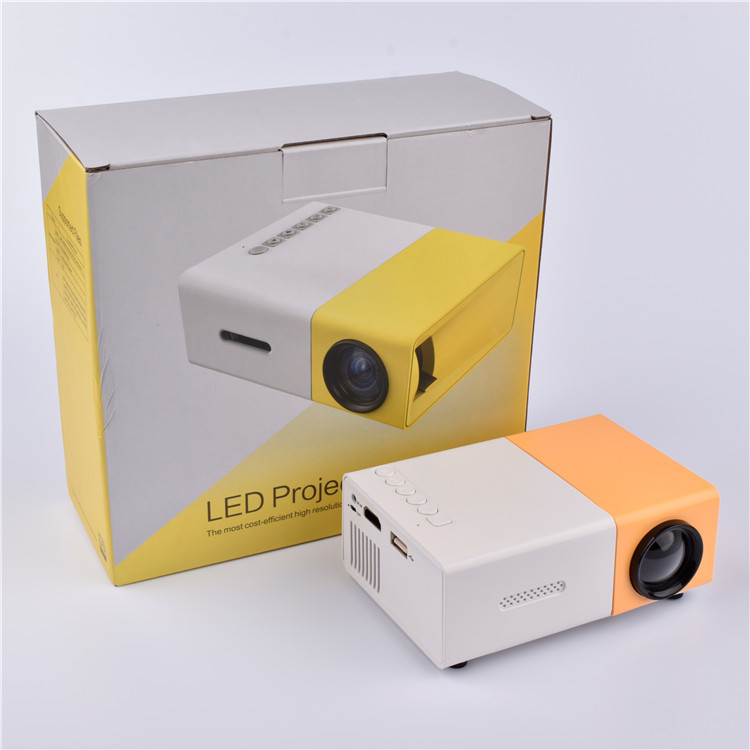 Cross-border explosions children mini projector mini portable LED projector YG300 small yellow machine home early education