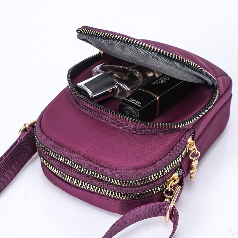 Factory wholesale new fashion trendy one-shoulder mobile phone bag crossbody small bag vertical small shoulder bag nylon coin bag
