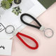 Spot creative woven leather rope keychain pu leather rope car pendant key chain to push small gift manufacturers wholesale