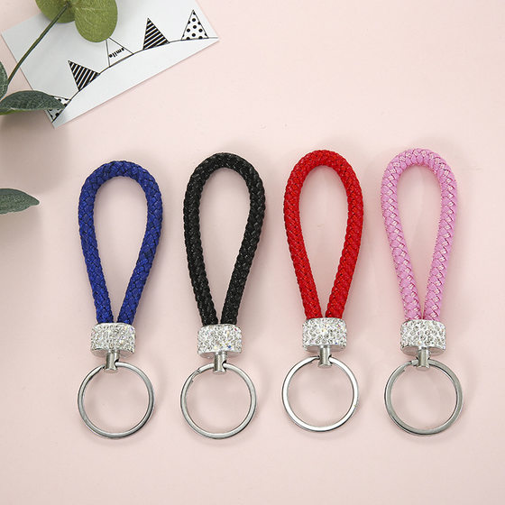 Spot creative woven leather rope keychain pu leather rope car pendant key chain to push small gift manufacturers wholesale
