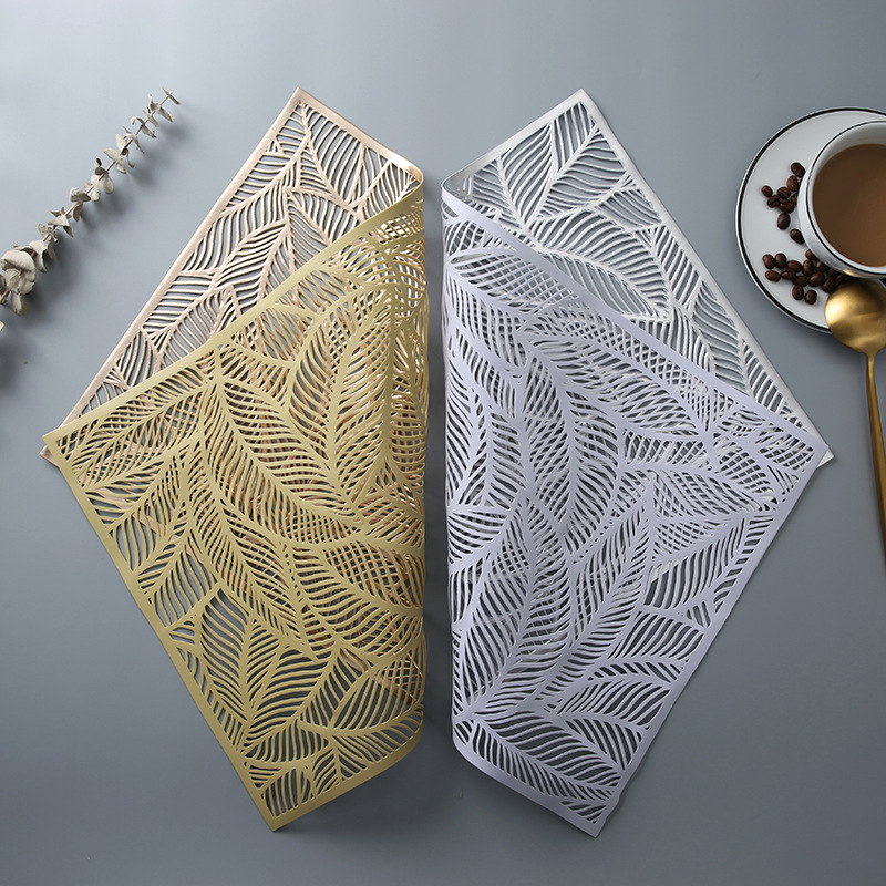 New rectangular combination leaf hollow PVC western dining mat ins light luxury gold embossed pure color heat insulation pad waterproof dining table mat 