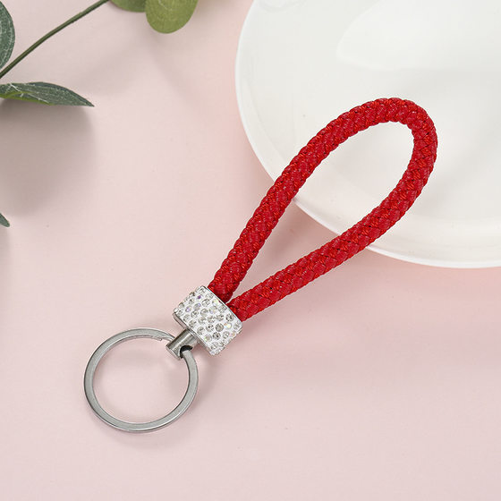 Spot creative woven leather rope keychain pu leather rope car pendant key chain to push small gift manufacturers wholesale