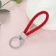 Spot creative woven leather rope keychain pu leather rope car pendant key chain to push small gift manufacturers wholesale