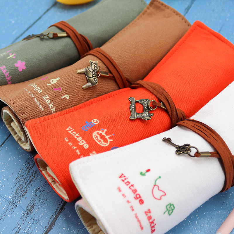 Factory direct Korean small fresh cotton retro roll pencil case creative student canvas stationery bag pen curtain