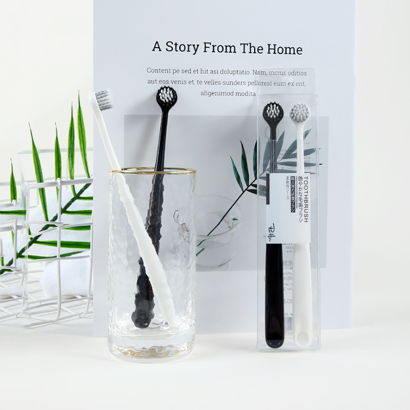 Couple toothbrush 2 pcs imported spiral hair toothbrush black and white round head adult soft hair toothbrush manufacturer