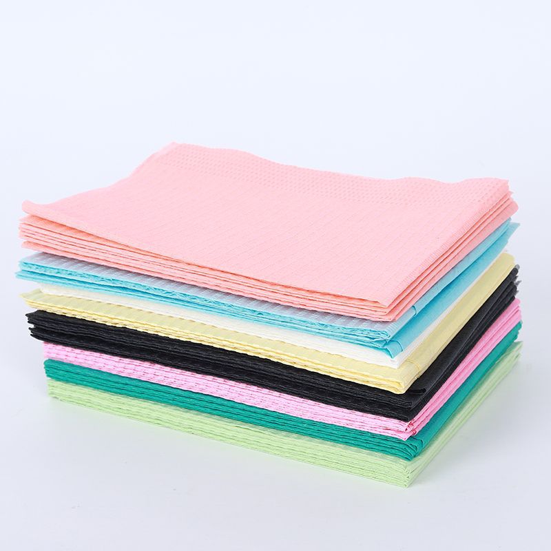 Factory production dental pad consumables wholesale various color disposable oral bib dental pad towel paper film cushion towel