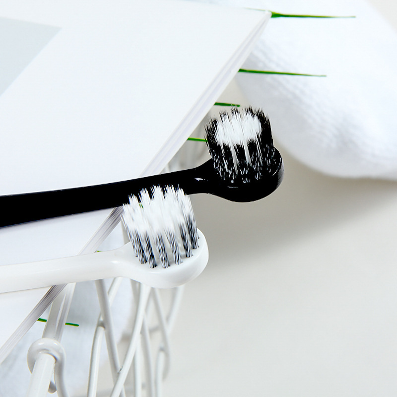 Couple toothbrush 2 pcs imported spiral hair toothbrush black and white round head adult soft hair toothbrush manufacturer