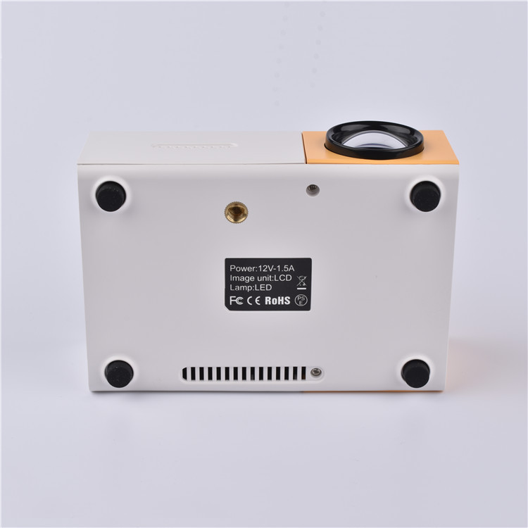 Cross-border explosions children mini projector mini portable LED projector YG300 small yellow machine home early education
