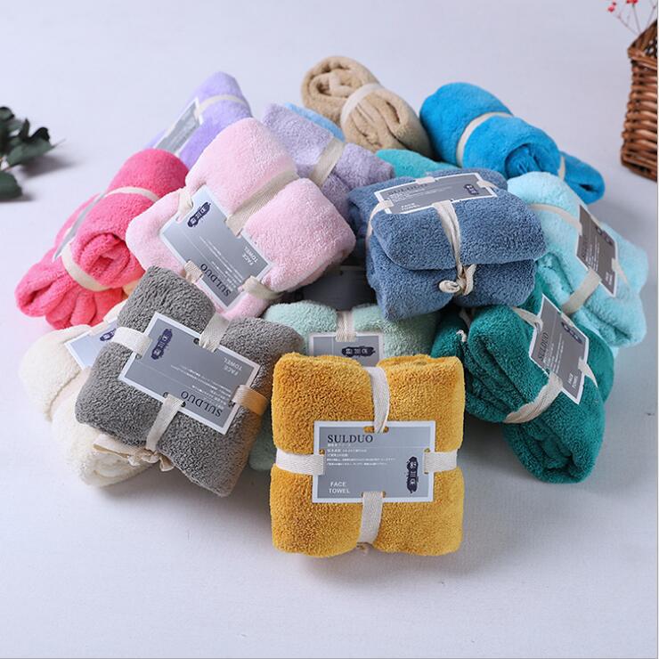 Factory direct supply 260 square polyester brocade warp knitted coral fleece towel absorbent towel face towel beauty salon towel wholesale