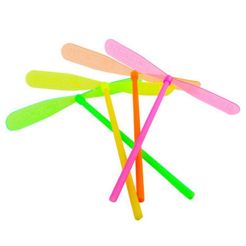 Wholesale hand rub bamboo dragonfly plastic dragonfly flying fairy trumpet children's educational nostalgic toys stall hot sale