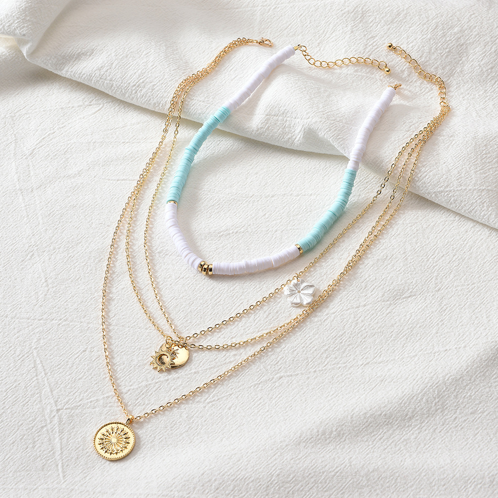 Europe and the United States cross-border retro multi-layer soft pottery flower necklace Net red flower coin personality exaggerated sweater chain pendant clavicle chain