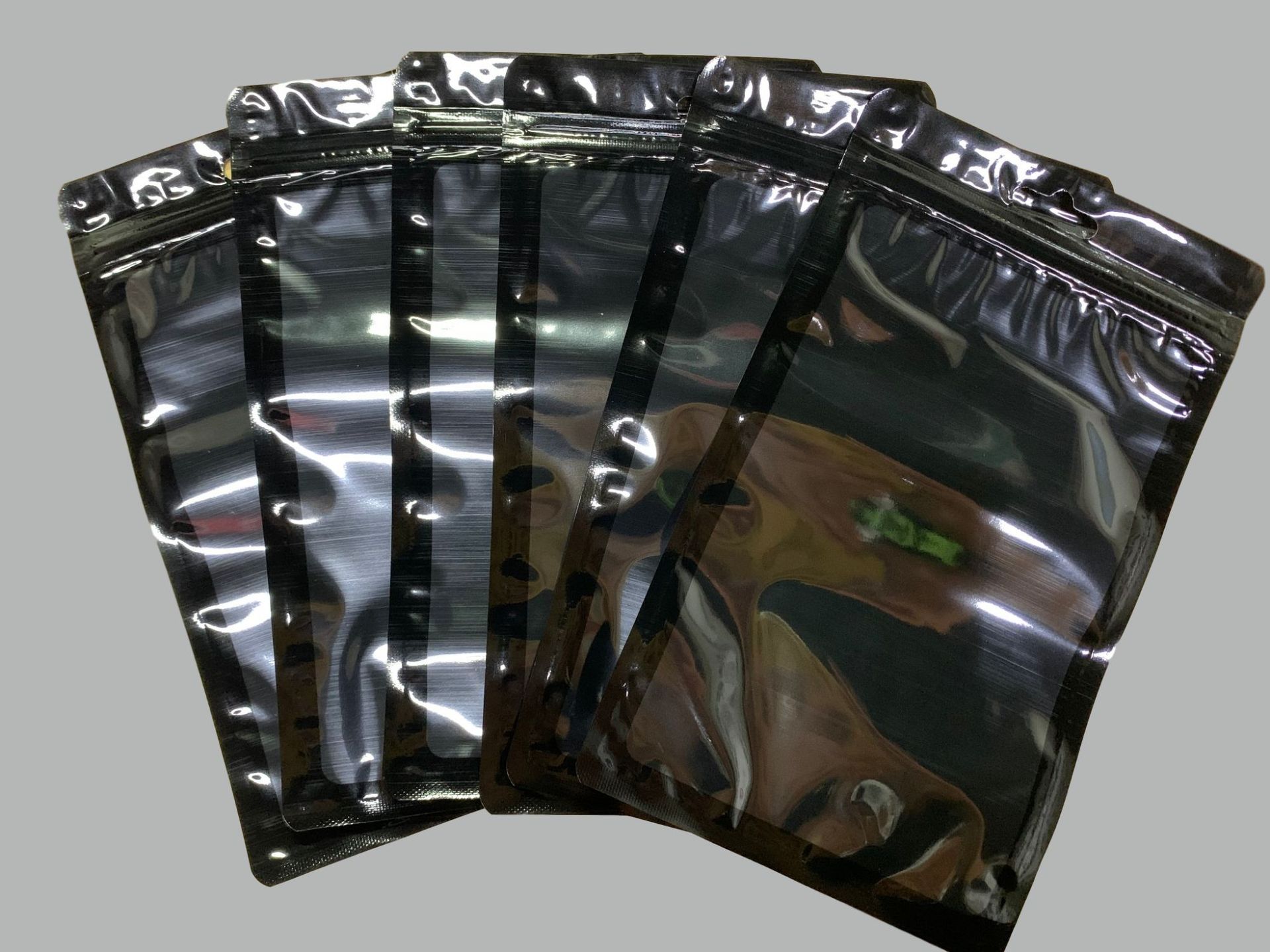 Black transparent pearlescent bag self-sealing bag universal neutral yin and yang composite bone 5.5 inch mobile phone case packaging bag