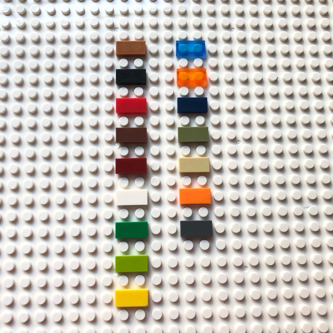 One kilogram of about 3580 grain domestic building blocks are compatible with Lego 3069 small grain light board plane 1x 2 building blocks