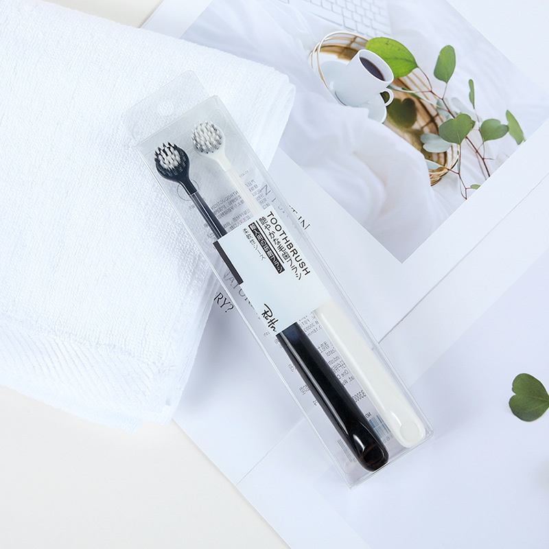 Couple toothbrush 2 pcs imported spiral hair toothbrush black and white round head adult soft hair toothbrush manufacturer