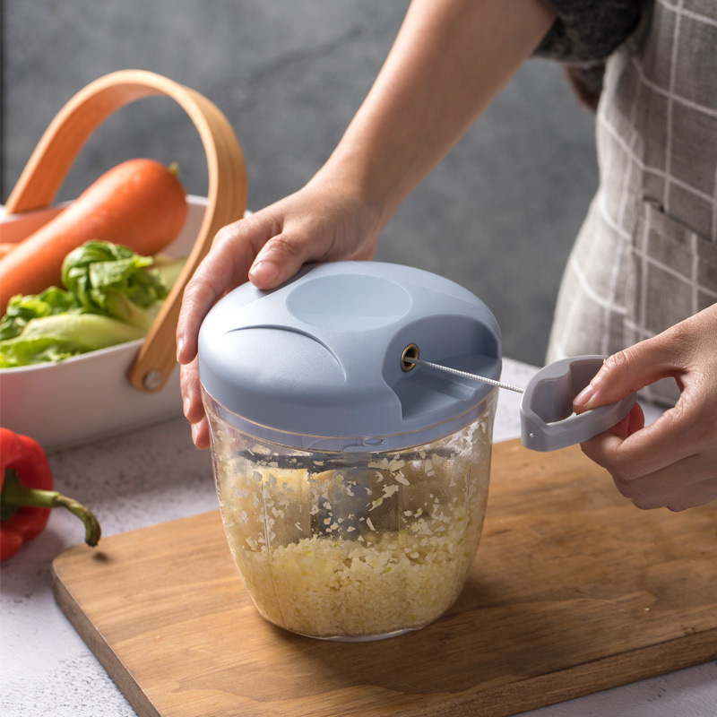 ひもを引いて野菜を切る器家庭用ニンニクを引いて唐辛子を切って果物の泥を打ちます。|undefined