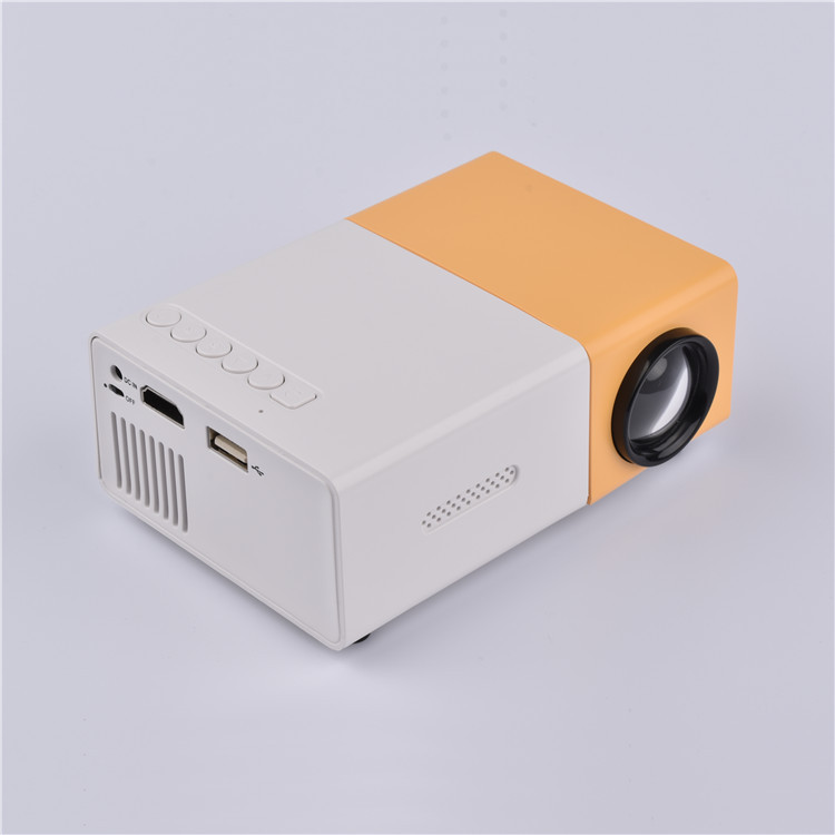 Cross-border explosions children mini projector mini portable LED projector YG300 small yellow machine home early education