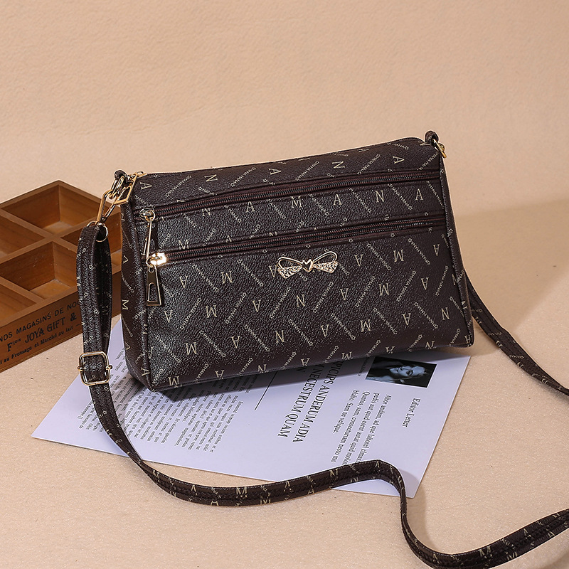 Bag spring and summer new messenger bag Korean middle-aged and elderly mother flower shoulder bag running Jianghu stall women's bag wholesale