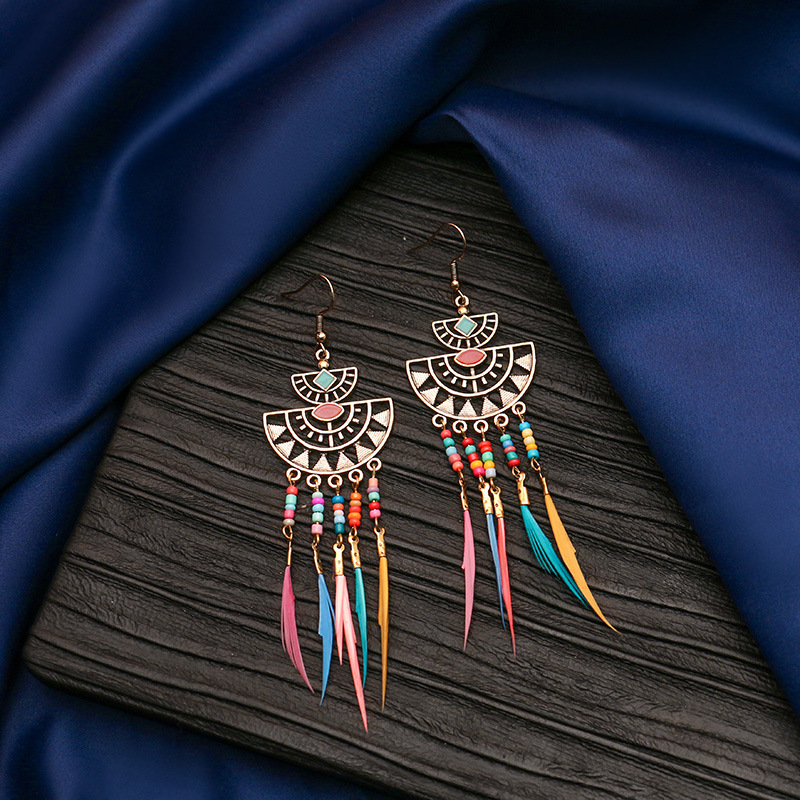 Hanqi jewelry European and American personality exaggerated hollow bohemian colorful rice beads feather tassel earrings