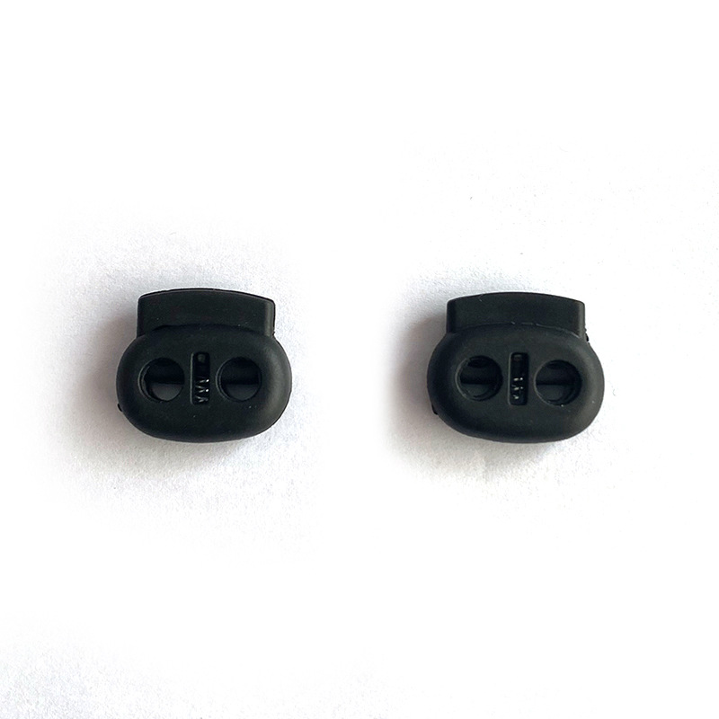 Single and double hole spring buckle windproof cap rope buckle flat single eye nylon pig nose buckle round bead luggage accessories plastic drawstring buckle