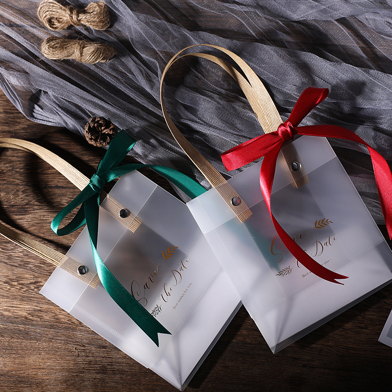 Transparent gift bag custom graduate day gift handbag plastic frosted children's day gift bag wholesale