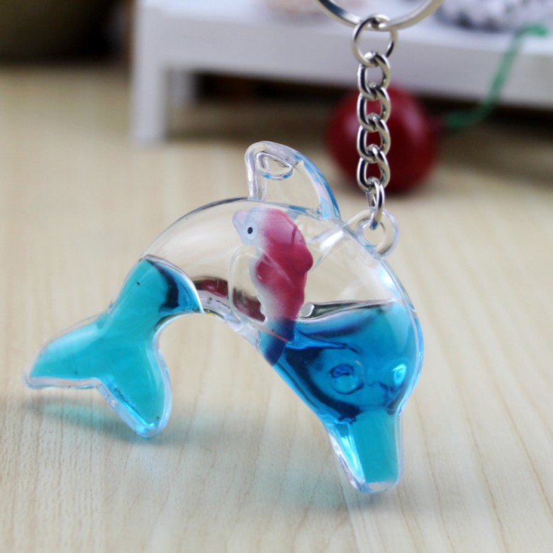 Dolphin floating bag pendant oil leakage cartoon small gift creative keychain key ring aquarium gift