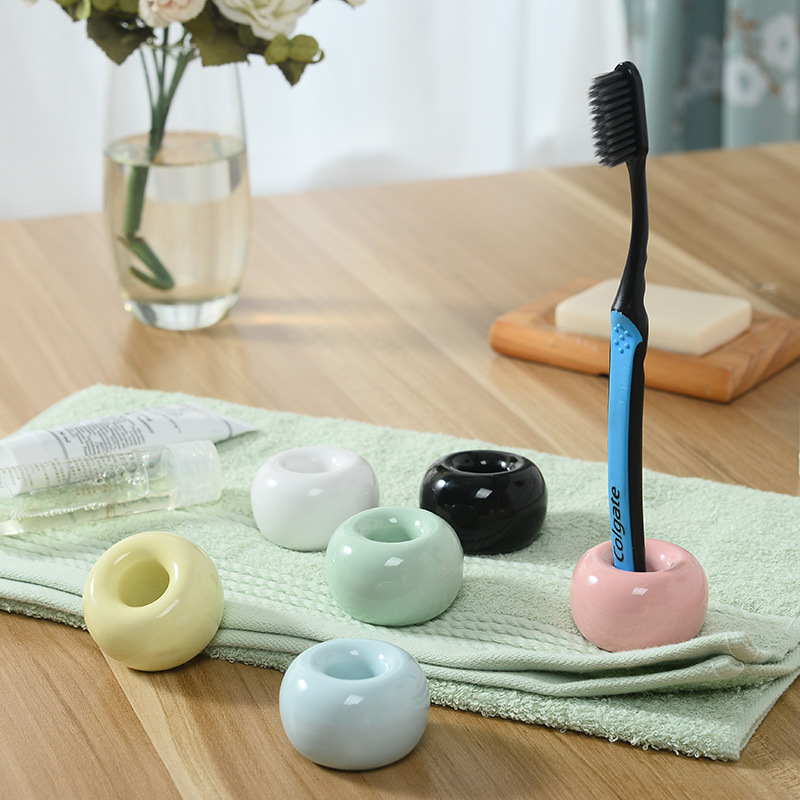 Creative toothbrush holder ceramic dental holder fashion personality simple toothbrush holder couple toothbrush base frame logo production