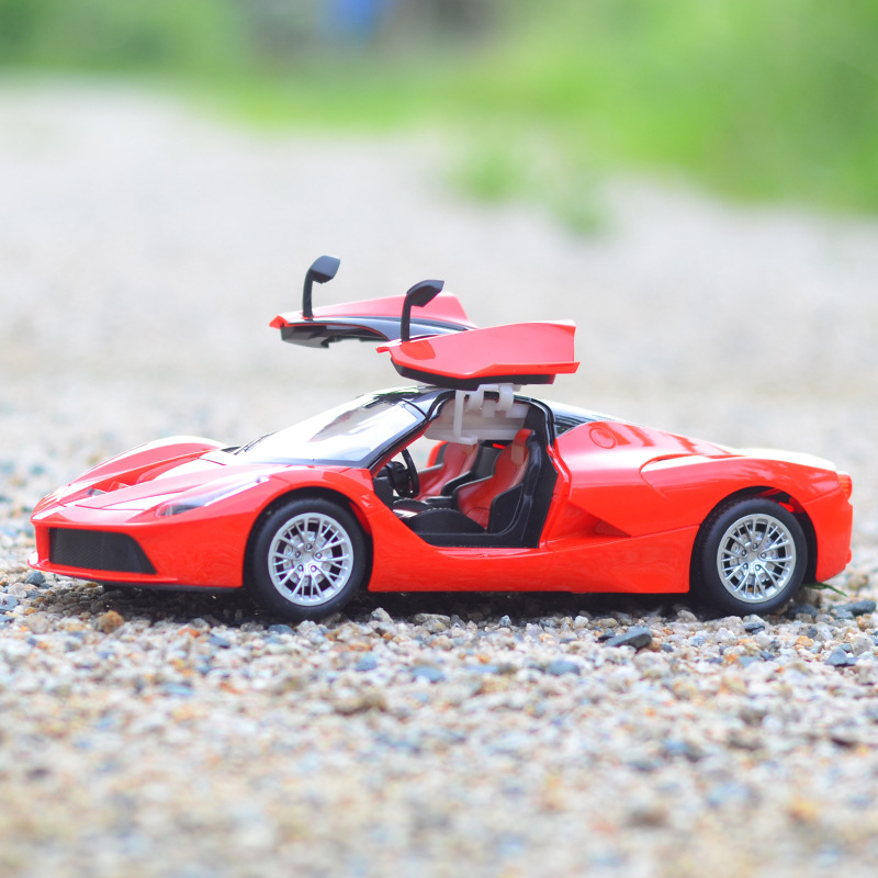 1:14 Farah charging remote control car model gravity sensor children's toy model cool light one-button door opening