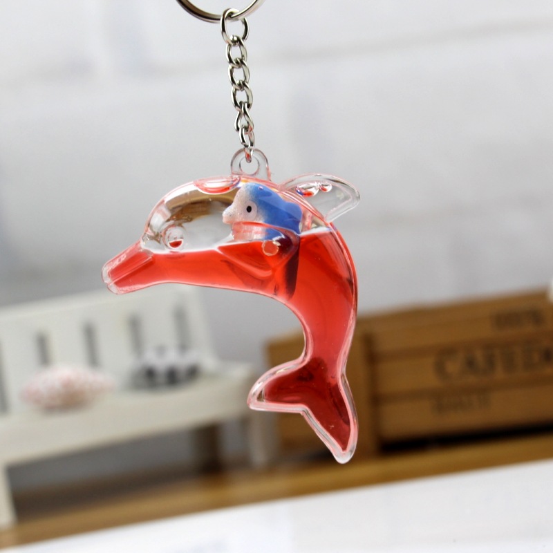 Dolphin floating bag pendant oil leakage cartoon small gift creative keychain key ring aquarium gift