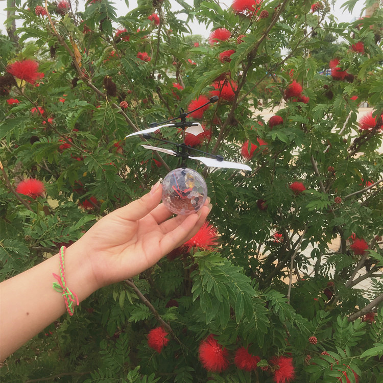 Cross-border hot sale induction flying machine crystal ball usb charging novelty mini flying toy