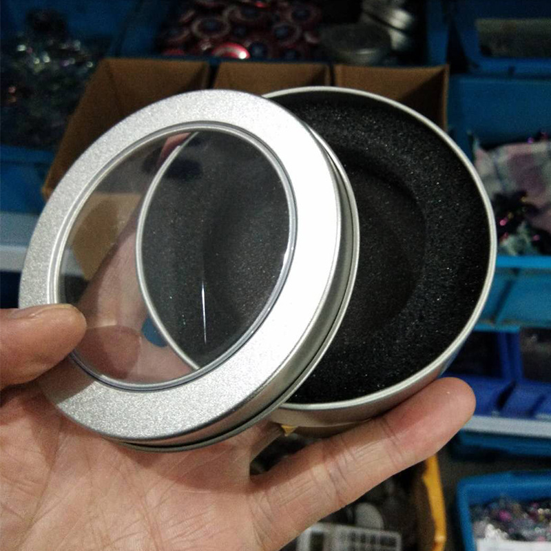 Factory supply fingertip gyro round iron box plastic box suspension box 9020 tinplate box spot wholesale box