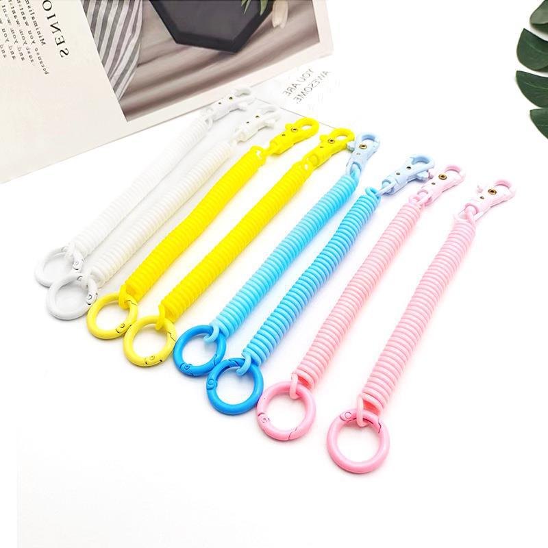 Factory wholesale plastic spring rope jelly color key chain bag card set lanyard key chain elastic anti-loss rope
