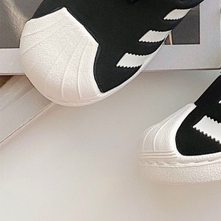 Children's shoes 2025 spring and autumn new one-on-one children's shell-toe sports shoes for boys and girls soft-soled running shoes soft shell shoes